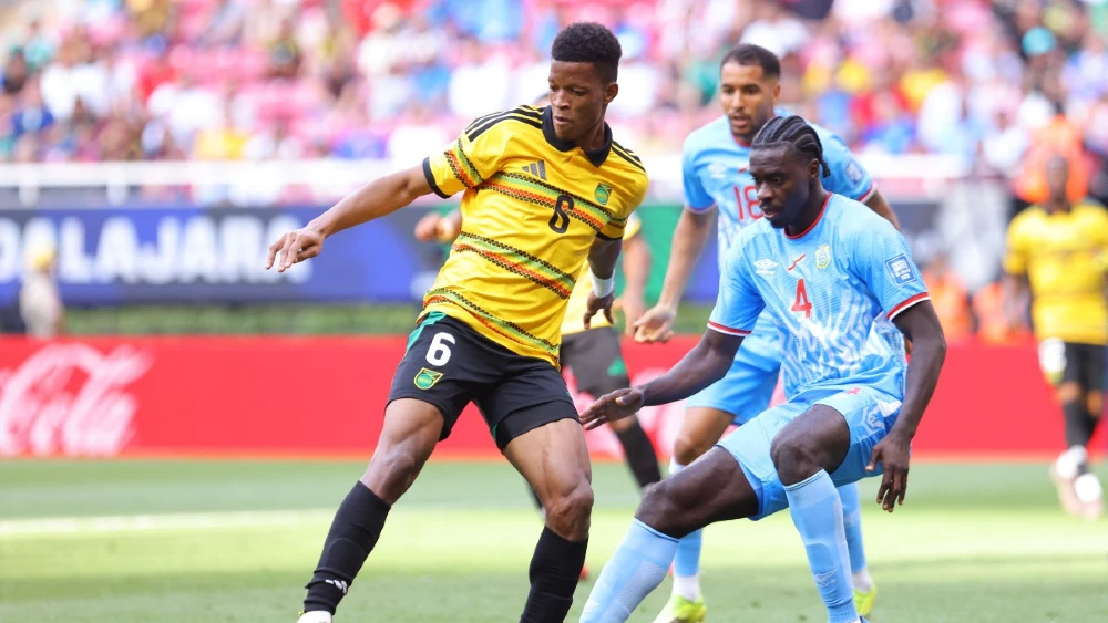 DR Congo fans dance in the rain after sealing World Cup spot